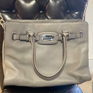 Michael Kors used only on one occasion only. 
Hamilton leather handbag